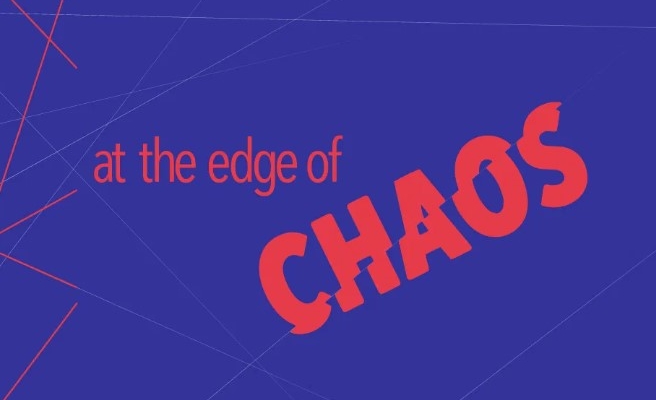 sfondo blu, scritta rossa "at the Edge of Chaos"