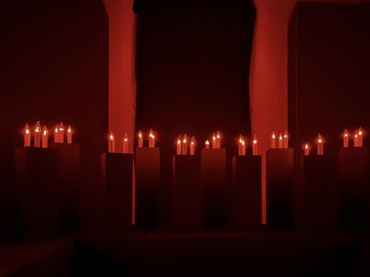 Dettaglio del rituale delle 100 candele